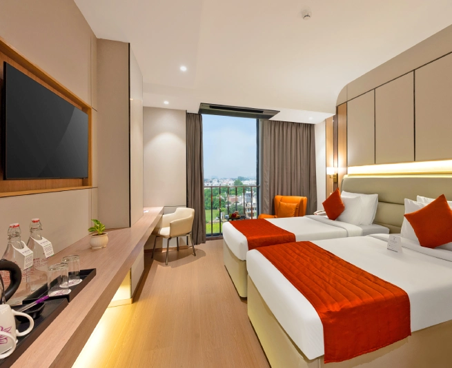 Deluxe Twin Room at Orchid Hotel Chandigarh Zirakpur with twin beds – ideal hotel rooms in Chandigarh for friends and business travelers