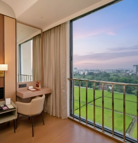 Club Room with large windows and city view at Orchid Hotel Chandigarh Zirakpur – luxury hotel stay booking