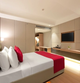 Book Deluxe Room at Orchid Hotel Chandigarh – Premium hotel stay in Zirakpur near Chandigarh Deluxe Room at Orchid Hotel Chandigarh with king size bed and modern interiors in Zirakpur – book premium stay online
