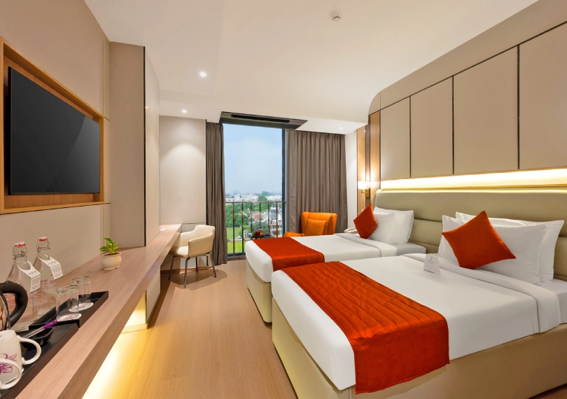 Deluxe Twin Room at Orchid Hotel Chandigarh with twin beds in Zirakpur – book comfortable hotel stay online