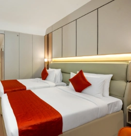 Modern interior of Deluxe Twin Room at Orchid Hotel Chandigarh with elegant design and twin beds – book premium stay today