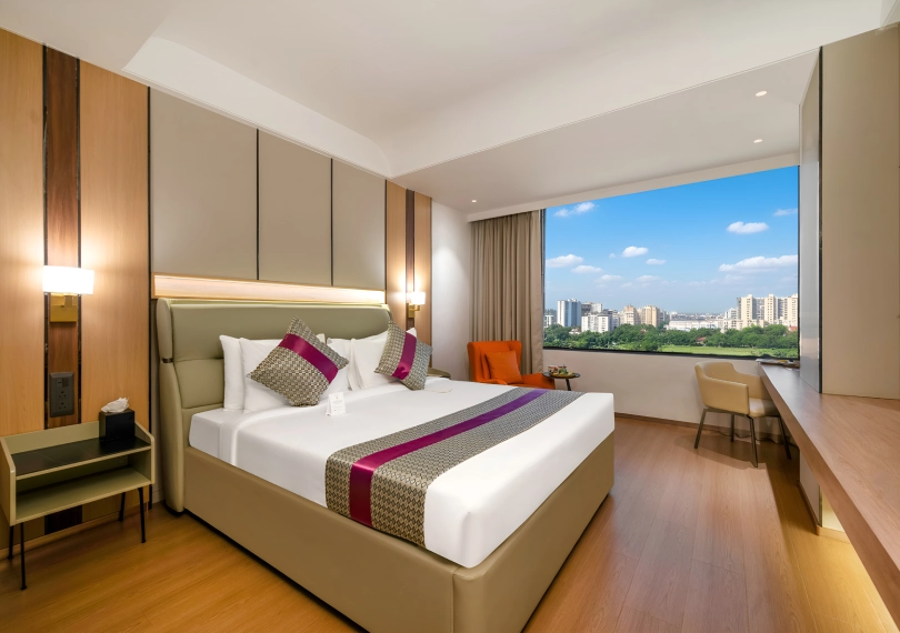 Book Premier Room at Orchid Hotel Chandigarh Zirakpur – Premium stay near Chandigarh Airport with modern comfort Premier Room at Orchid Hotel Chandigarh Zirakpur with king size bed, spacious layout and city view – book premium hotel room near Chandigarh airport online