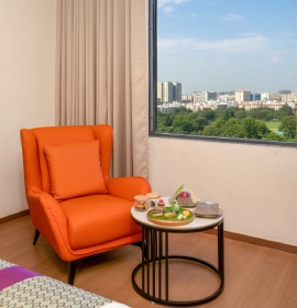 Book Premier Room with modern interiors at Orchid Hotel Chandigarh – Ideal for business stay near Chandigarh Modern interior of Premier Room at Orchid Hotel Chandigarh with elegant design, workspace and premium amenities – book hotel room online in Zirakpur