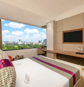 Book Premier Room with city view at Orchid Hotel Chandigarh – Best hotel stay in Zirakpur Chandigarh Premier Room with large windows and panoramic city view at Orchid Hotel Chandigarh Zirakpur – premium hotel booking near Chandigarh