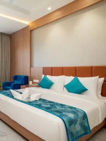 An overview of a palace and a watch tower in the middle of Lakhota Lake