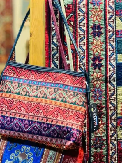 Saree fabric arranged in shelves