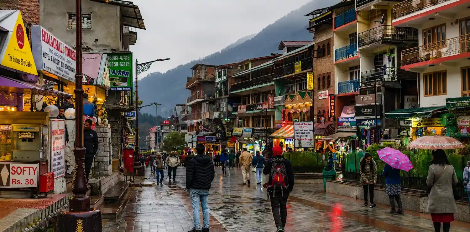 The Orchid Hotel Manali surrounded by Himalayan mountains and valley views