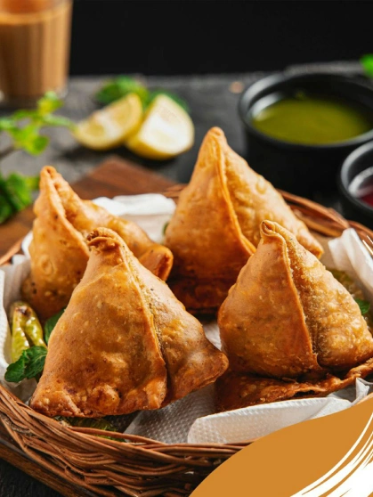 plate of samosas and chutney