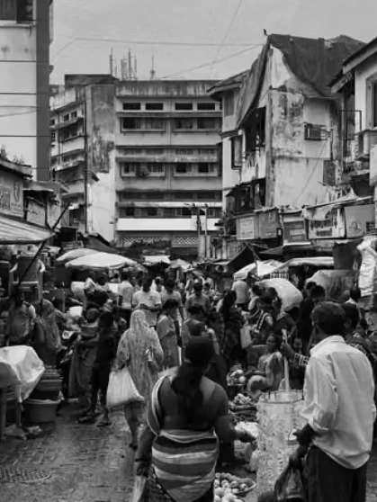 A person holding a flashlight inside a cave