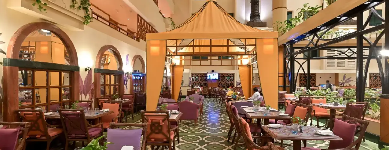 Rooftop Dining at The Orchid Hotel Vile Parle Mumbai Open-air terrace dining with panoramic city views at The Orchid Hotel Vile Parle Mumbai