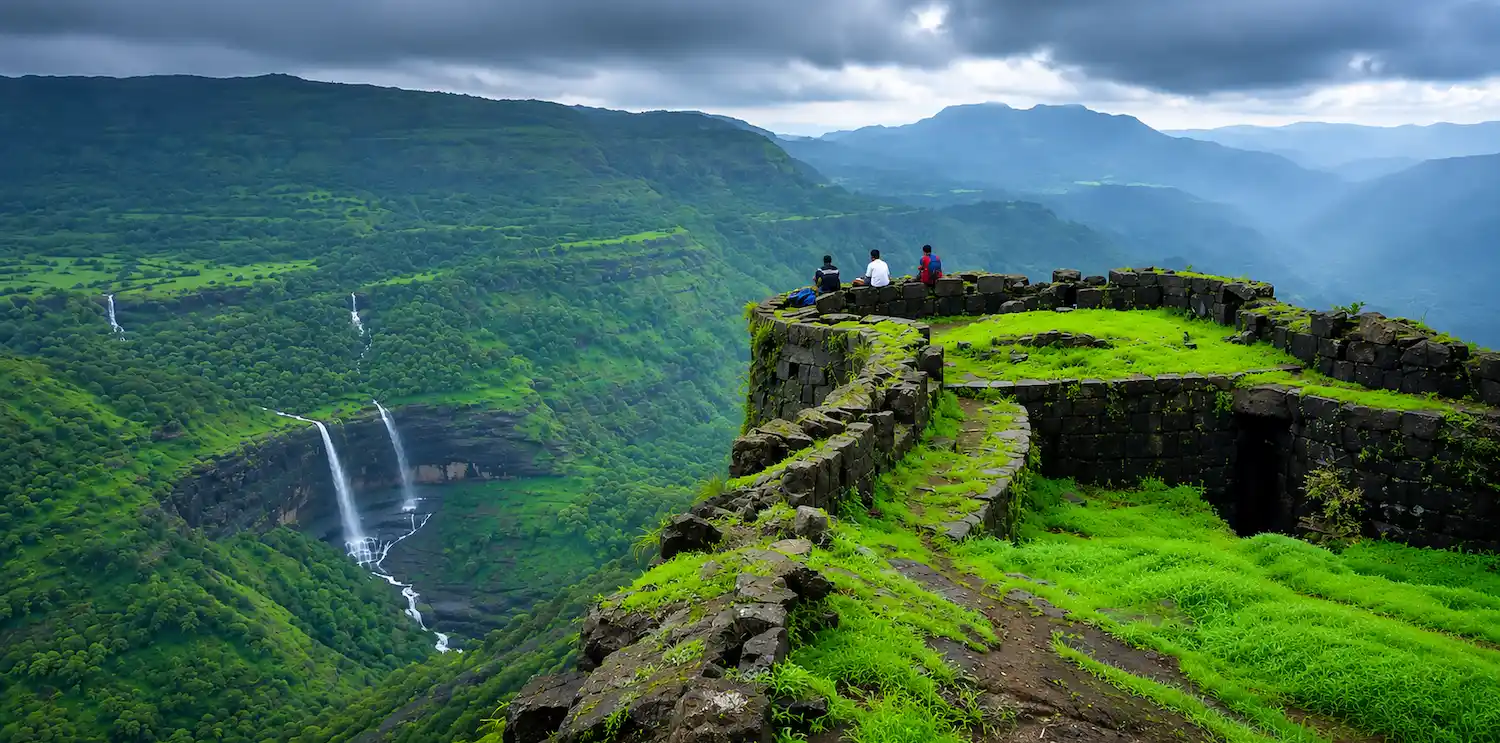 Stay in Pune for Fort Treks and Outdoor Adventures | The Orchid Hotel Pune Trekkers at a fort near Pune