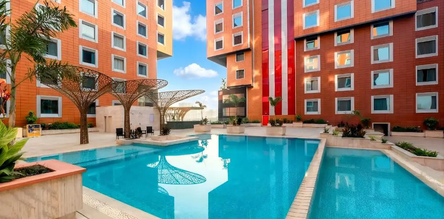 Book a Weekend Staycation in Pune | The Orchid Hotel Pune Outdoor pool at The Orchid Hotel Pune