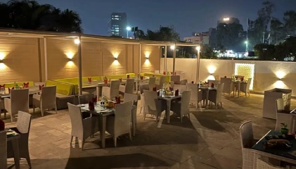 The Orchid Hotel Pune Cherry Blossom seating arrangement with cherry blossom tree