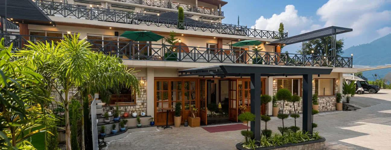Luxury hotel suite at Orchid Rishikesh with mountain and river views