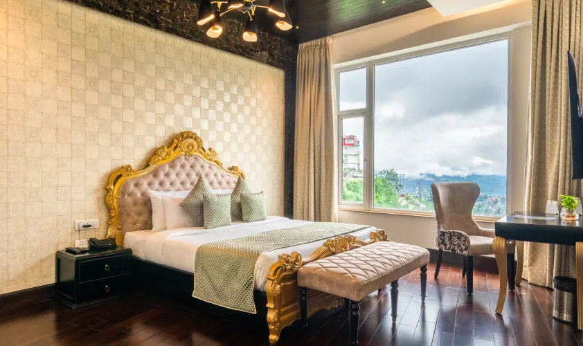 Stay in boutique suites at Orchid Shimla with warm interiors, mountain views, and luxury amenities for families and couples alike. Boutique hotel room in Shimla Mall Road – luxury stay at Orchid