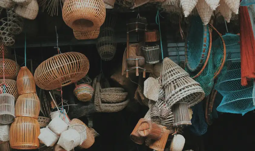 Artisans carving wooden handicrafts at Lakkar Bazaar Shimla – famous market for Himachali wooden souvenirs