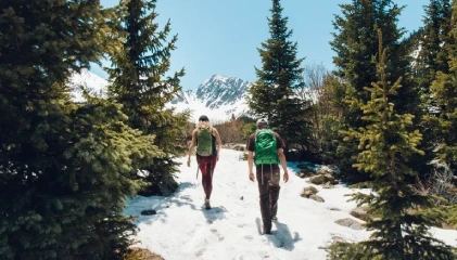 Shimla Snow Trekking Experience Walking on a snow-covered hill in Shimla during winter trek