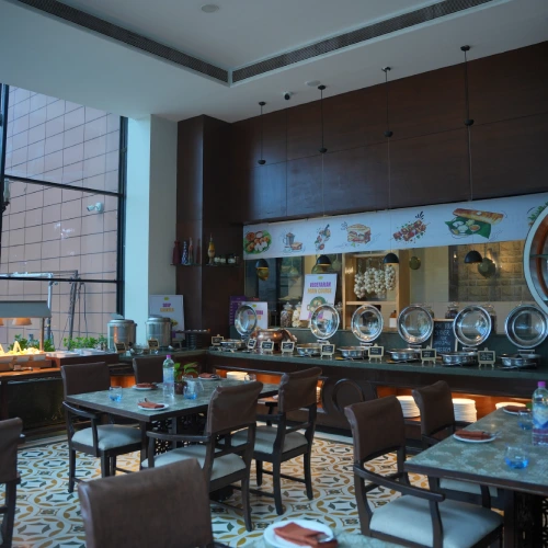 Fine dining restaurant at The Orchid Hotel Pune offering Indian and international cuisine Fine dining restaurant at The Orchid Hotel Pune offering Indian and international cuisine