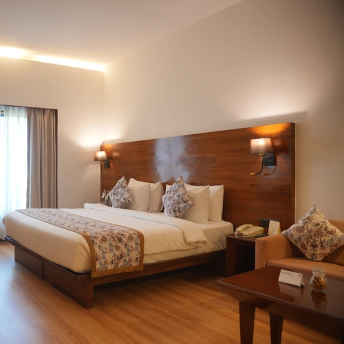 Luxury hotel room at The Orchid Hotel Pune with modern amenities and comfortable interiors Luxury hotel room at The Orchid Hotel Pune with modern amenities and comfortable interiors