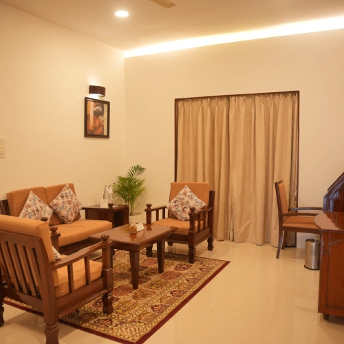 Spacious hotel room with comfortable seating area at The Orchid Pune Spacious hotel room with comfortable seating area at The Orchid Pune
