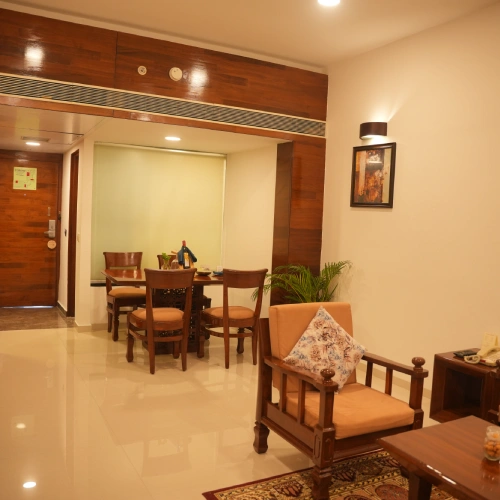 Spacious guest room with elegant furnishings at The Orchid Hotel Pune Balewadi Spacious guest room with elegant furnishings at The Orchid Hotel Pune Balewadi