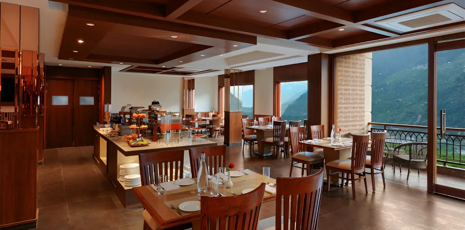Best Cafe in Manali with Mountain View – Cafe Vindhyas Cafe Vindhyas with Scenic Valley View at Orchid Hotel Manali