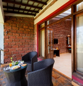 Luxury bed in Sea Breeze Suite, Dapoli