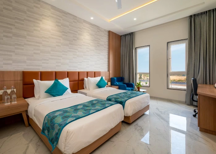Twin Beds in Deluxe Room - Orchid Hotel Jamnagar Deluxe Room Twin Beds - Orchid Hotel Jamnagar