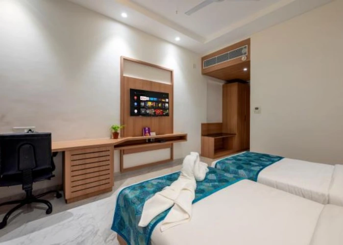 Unwind in the Luxurious Bedding of Our Premier Room at Orchid Hotel Jamnagar Comfortable Bed Setup in Premier Room