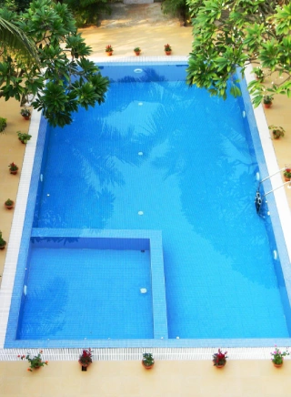 Clean and serene swimming pool at Mahodadhi Palace heritage resort
