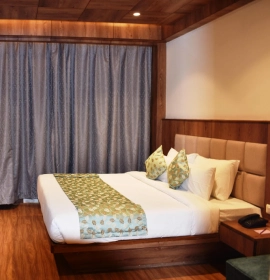 Club Room with balcony and stunning valley views at Orchid Hotel Manali for a luxurious retreat