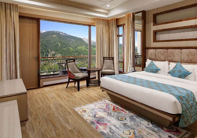 Presidential Suite at Orchid Hotel Manali featuring exclusive river views and premium luxury amenities