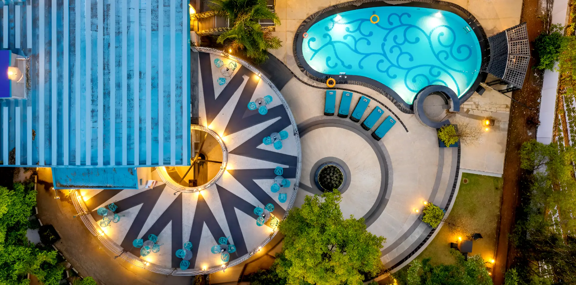 The Orchid Hotel Panchgani exterior view surrounded by hills and greenery