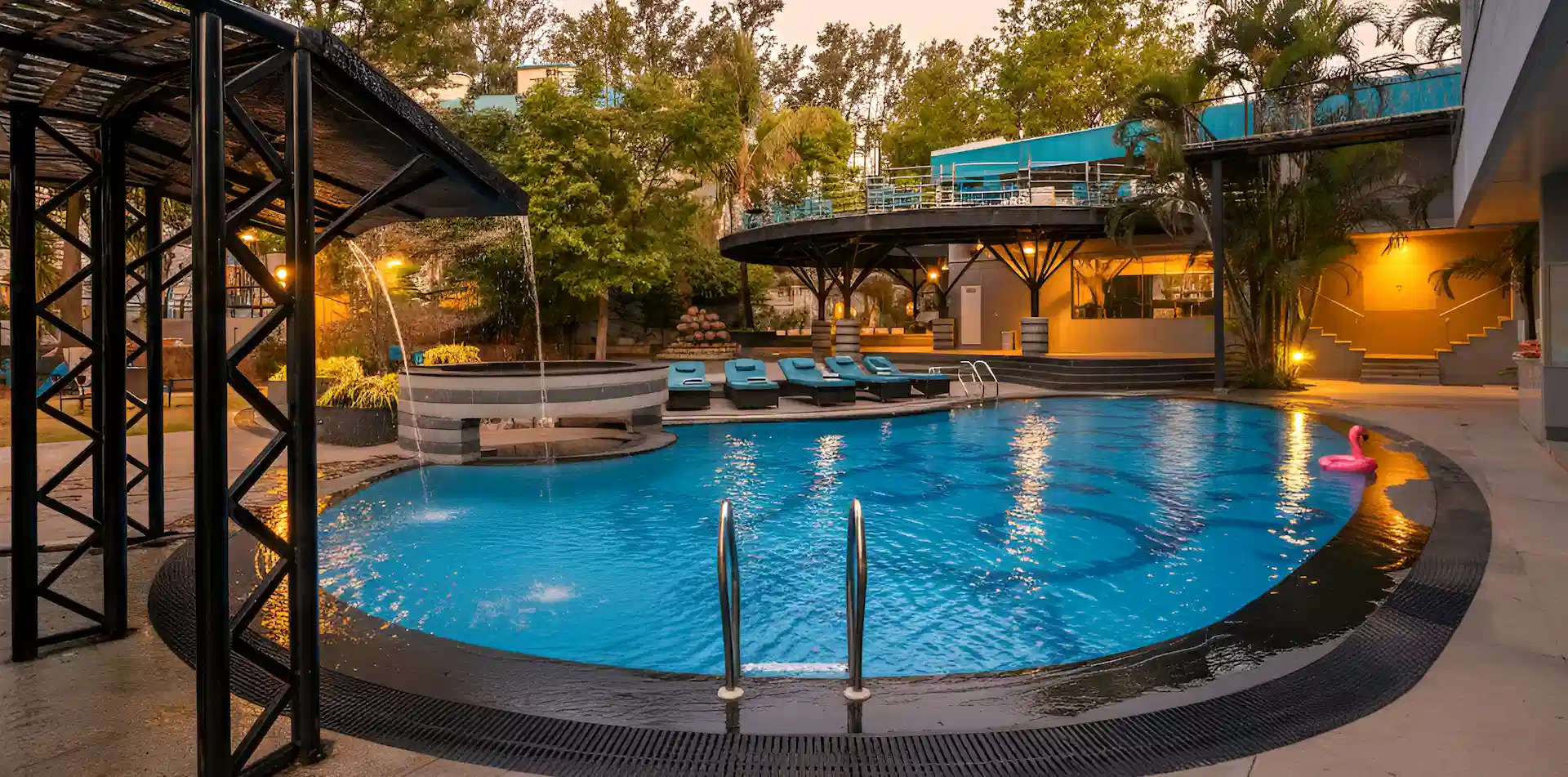 The Orchid Hotel Panchgani exterior view surrounded by hills and greenery