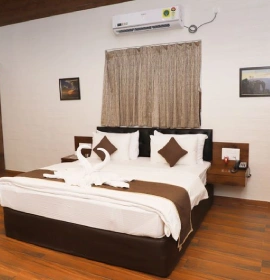 Bedroom in Forest Tent at Orchid Hotel Panchgani, ideal for couples and family stays near Mahabaleshwar