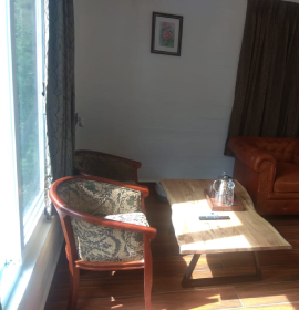 Balcony view from Meadows Room at Orchid Hotel Panchgani overlooking the Sahyadri valley