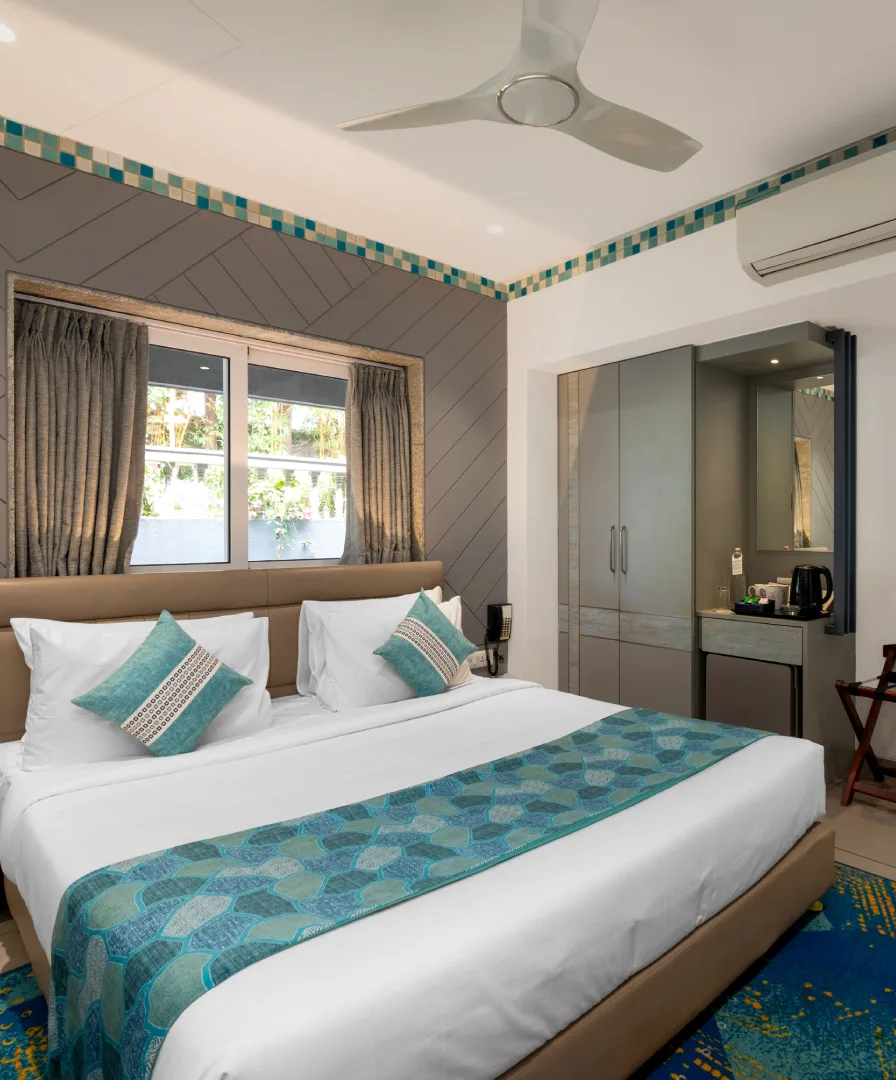 Dew Drop Room at The Orchid Hotel Panchgani with modern amenities and cozy interiors