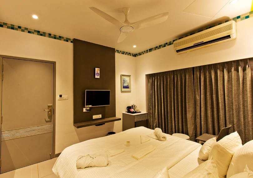 Interior of Dew Drop hotel Room at Orchid Hotel in Panchgani with elegant furnishings and Sahyadri valley views