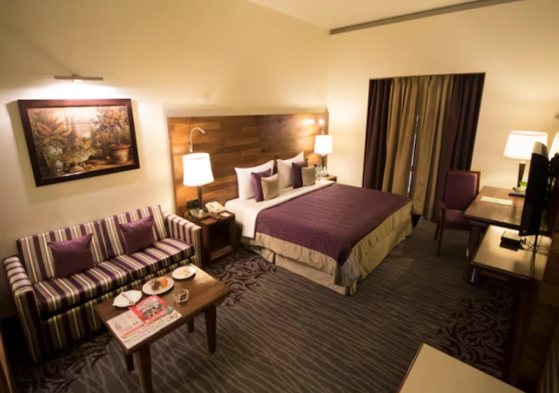 Elegant Premier Room with Bathtub in Pune, offering comfort and luxury