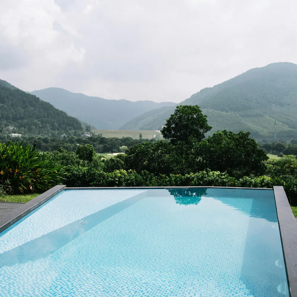 Outdoor swimming pool at Orchid Rishivan Rishikesh – hotel with pool in Rishikesh