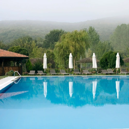 Swimming Pool Rishikesh | Orchid Rishivan Outdoor Swimming Pool at The Orchid Rishivan Rishikesh – Luxury Hotel Stay Near Byasi
