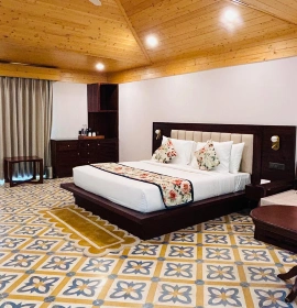 Book Prakruti Deluxe Room – Hotel in Rishikesh near Byasi with King Bed and Balcony Spacious Prakruti Deluxe Room at The Orchid Rishivan Rishikesh with Modern Amenities