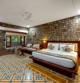 CBook Pushpa Vatika Club Room with Seating Area and King Bed at Orchid Hotel Rishikesh Pushpa Vatika Club Room Seating Area and King Bed – Luxury Rishikesh Hotel