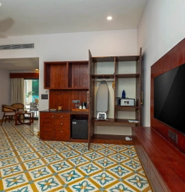 Van Drishti Premium Forest View Room Interior | Orchid Rishivan Rishikesh Van Drishti luxury hotel suite with king-size bed and forest view | Orchid Rishivan Rishikesh