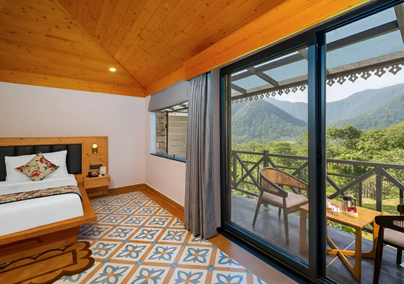 Book Deluxe Rishikesh Room Near Ganges | Orchid Hotel Book hotel room in Rishikesh with Forest Balcony View