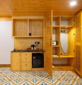 Book Rishikesh Resort Room with King Bed | Orchid Hotel Stay in Luxury bedroom with king-size bed in Rishikesh resort near Byasi