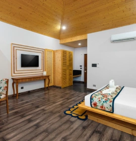 Book Rishikesh Resort Room with King Bed | Orchid Hotel Stay in Luxury bedroom with king-size bed in Rishikesh resort near Byasi