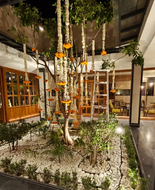 Outdoor poolside wedding reception at The Orchid Rishivan Rishikesh with scenic surroundings and luxury amenities