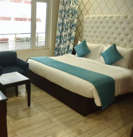 Luxury King Bed in Deluxe King Room Luxury king bed in Deluxe King Room with scenic views