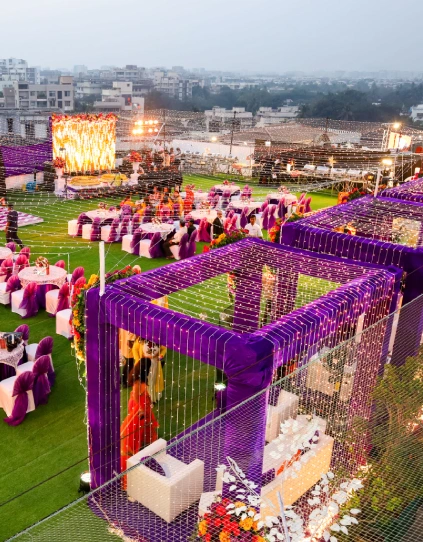 Enquire now to book evening rooftop banquet with lighting setup at Orchid Hotel